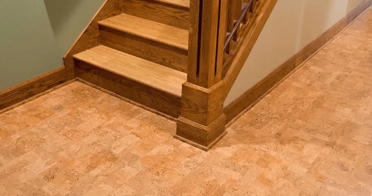 End of a staircase with cork flooring in Grand Rapids, MI