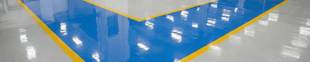 A factory floor professionally covered and marked with epoxy flooring in Grand Rapids, MI
