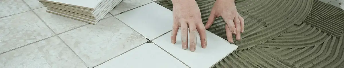 Professional installing white tile floors in Grand Rapids, MI