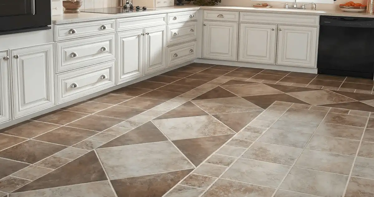 Kitchen with white cabinets and a professionally installed tile floor in Grand Rapids, MI